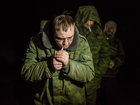 Ukraine: Prisoner swap, heavy weapons withdrawal
