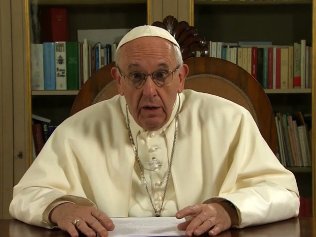 Pope Francis wants the faithful to lift hearts, not cell phones, during Mass