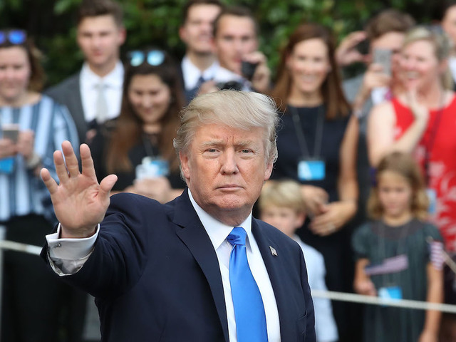 Justices allow strict enforcement of Trump refugee ban