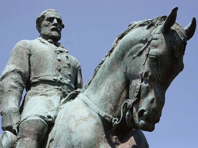 Charlottesville covers Confederate statue in black