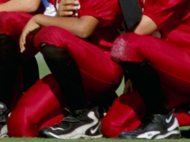 Entire Illinois youth football team kneels for national anthem before game