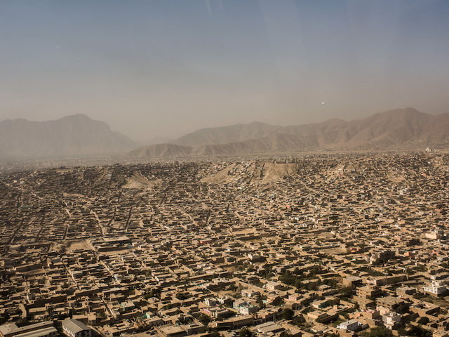 Dozens killed as blasts rock Kabul