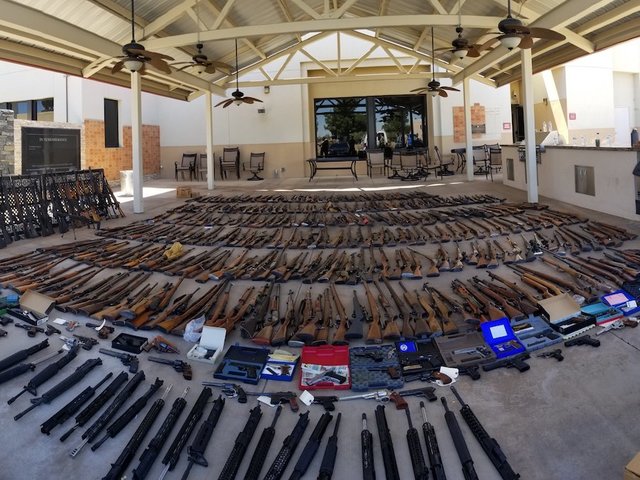 Over 500 guns found at convicted felon's California home, officials say