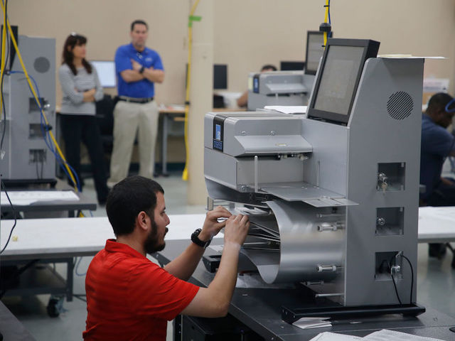 Florida county collects uncounted ballots left in a mail facility