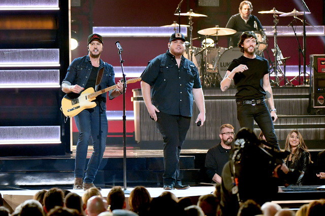 Photos: Celebrities gather for the CMA Awards