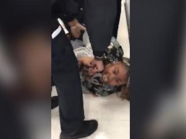 Watch: NYPD officers pry 1-year-old child from mother's arms, sparking outrage and criticism